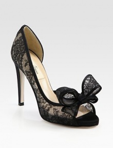 Intricately crafted, semi-sheer lace silhouette with a skinny heel, peep toe and divine bow adornment. Self-covered heel, 4 (100mm)Semi-sheer lace upperLeather lining and solePadded insoleMade in Italy