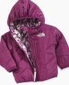 Keep your bundle of energy warm as she romps around in the winter with this reversible jacket from The North Face.