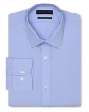 Dress shirt with spread collar, two button barrel cuffs and a slimmer fit through the body, with a solid blue hue.