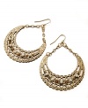 Textured, beaded, and completely fabulous! Style&co.'s crescent-shaped hoop earrings boast neutral-hued acrylic beads and glass accents in antique gold tone mixed metal. Approximate length: 2 inches. Approximate width: 1-3/4 inches.