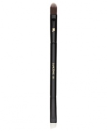 This versatile dual-ended brush is the ideal partner to eye shadows, both powder (wet or dry) and cream shadows. Designed with two sides for portability and convenience: the flat, angled side precisely lines the lid and lower lash line, while the tapered, rounded side perfectly blends. Angled side cut at sharper angle for better lining and use in the brow. How to use: Apply shadow to back of hand to warm and remove excess. To shape, shade or highlight place the rounded side of the brush upside down into the lash line and blend upward toward the crease for even application. To define and line gently sketch the flat, angled side of the brush through the lash line to achieve desired look.