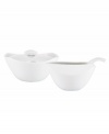 Feature modern elegance on your menu with the Classic Fjord sugar and creamer from Dansk's collection of serveware and serving dishes. The set serves up glossy white porcelain in innovative shapes that keep tables looking totally fresh.