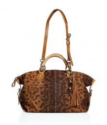 Channel of-the-moment style with this leopard printed bag from Henry Beguelin - Slouchy shape, side leather straps with buckle details, small carrying handles and adjustable shoulder strap, all-over leopard print, bead and tassel charm - Pair with your favorite new-season staples