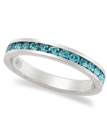 Traditions beautiful stacking ring is perfect when paired with other slim rings, but makes a pretty sparkling statement all its own. Crafted in sterling silver, a thin band features round-cut blue crystals with Swarovski elements. Size 5-10.