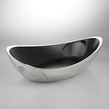 Designed by Neil Cohen, the sweeping piece features a flowing, organic rim with smoothly upswept sides and scooped handles for a look that is ready to take wing. The Butterfly casserole dish is gleaming and gorgeous, the piece comes in three sizes for a lifetime of usefulness and appreciation.