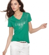 A shower of shimmering sequins gives an edge to Calvin Klein Jeans' classic V-neck tee!