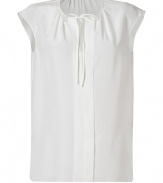 Perfect for both dressing up and down, Josephs pristine off-white crepe de chine silk top is a sleek choice with endless wearing possibilities - Round neckline with tie and pleating detail, sleeveless, slit front, layered front panel, side slits - Loose fit - Wear with a pencil skirt and heels, or with favorite skinnies and flats