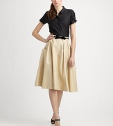 Style is in full swing with this pleated cotton/linen skirt featuring a duo of patch pockets.Belt loopsPleated designPatch pocketsBack zipperAbout 29 long52% cotton/48% linenDry cleanImported