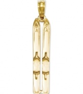 Conquer the mountains in style with this cute charm. A 3D design displays a set of skis in 14k gold. Chain not included. Approximate length: 1-1/10 inches. Approximate width: 1/5 inch.