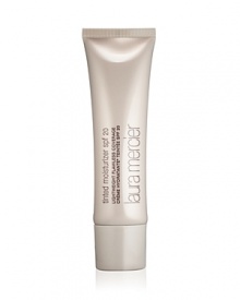 Laura's revolutionary and award-winning Tinted Moisturizer is a sheer, lightweight formula with SPF 20 and a hint of color that can be used in place of foundation for a natural appearance and healthy glow.Now in two new shades: Blush and Tawny.Key claims: • Lightweight, moisturizing formula hydrates skin and softens fine, dry lines• Provides sheer coverage with a natural, dewy finish• Adds a smooth, healthy glow to the complexion• Stays color-true and wears evenly• Extended wear is ideal for active lifestyles• Subtly perfects the face while providing ideal protection from the harmful and damaging rays of the sun• Broad spectrum UVA and UVB protection SPF 20• Dermatologically tested• Allergy tested to minimize the risk of allergy and irritation• All skin types, including sensitive skin• Non-comedogenicKey ingredients:• Features an antioxidant Vitamin C and E complex that acts as a free radical scavenger to help protect the skin from even the most aggressive effects of the environment