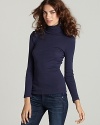 Super comfortable and a perfect addition to any wardrobe, this chic turtleneck is rendered in a luxuriously soft blend of Supima cotton and modal. Wear with leggings or skinny jeans for a streamlined silhouette.