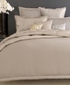 The ideal addition to the Platinum Ash bedding collection from Donna Karan, this fitted sheet features 400-thread count cotton sateen for a soft hand.