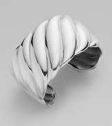 From the Sculpted Cable Collection. A wide sterling silver cuff recreates Yurman's twisted cable pattern on a grand scale. Sterling silver Width, about 1½ Diameter, about 2¼ Imported