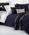 This Windsor Navy duvet cover from Hugo Boss is the perfect finishing touch for your bedding ensemble. 350-thread count cotton sateen fabric provides endless comfort. Button closure.