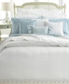 Luxurious white-on-white quilted details lend sumptuous texture to this Spring Hill quilt from Lauren by Ralph Lauren. Finished with scalloped edges. Reverses to solid.