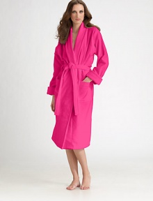 A soft and sumptuous slip-on after a shower or before bed, crafted in pure cotton terry velour with a cozy shawl collar and oversized, roll-up cuffs. Belted waist with loops Patch pockets Cotton terry velour; machine wash Imported