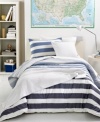 Give your bed a modern makeover with this Concordia Ice comforter set, featuring broad stripes in pale to dark blue hues and alternating white layers. Polished & preppy. It's classic Lacoste.