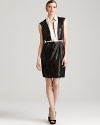 A sharply-structured Rachel Roy sheath dress gets futuristic reimagining with a jolt of metallics and a splash of sequins. Team with strappy sandals for an out-of-this-world ensemble.