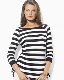 Bold stripes grace the front of a three quarter sleeve tee, crafted with an elegant ballet neckline and drawcord detailing at the hem to create chic ruching.