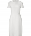 Pristine in ivory silk with delicately pleated matelass? short sleeves, Valentinos tailored sheath is an immaculate take on ladylike elegance - Rounded neckline, matelass? short sleeves, softly gathered waistline, hidden back zip - Softly tailored bodice with bust darts, full skirt - Wear with flawless patent leather pumps and a sleek envelope clutch