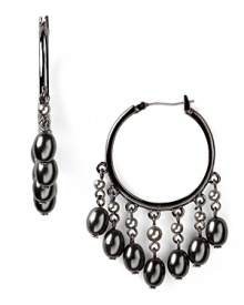 Gleaming hematite and gray pearls add dark elegance to denim and LDBs alike. From Lauren by Ralph Lauren.