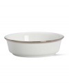 Beautiful in its simplicity, this dinnerware collection features a timeless, elegant design. The pristine white bone china is accented by a single, shimmering band of platinum. The understated beauty will add a refined sophistication to your dining experience for years to come. Qualifies for Rebate