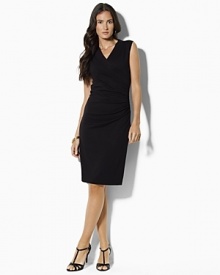 The Harvy exudes timeless polish in soft stretch jersey with crisp pressed pleats for a flattering, feminine sheath silhouette that elegantly hugs the body.