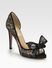 Intricately crafted, semi-sheer lace silhouette with a skinny heel, peep toe and divine bow adornment. Self-covered heel, 4 (100mm)Semi-sheer lace upperLeather lining and solePadded insoleMade in Italy