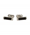 Add a gentlemanly accent to your formal look with these luxe cufflinks from Neil Barrett - Silver-tone cylindrical cufflinks with leather inlay - Pair with a slim suit and a patterned button down