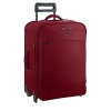 The expandable Briggs & Riley upright rolling luggage is the perfect mid-sized piece of for all your travel needs. Easily pack for one for a week-long vacation to the tropics, or a weekend getaway for two. A spacious main compartment enables incredible easy packing. Zip-around expansion increases packing capacity by 31%.