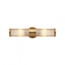 The subtle art deco design and warm natural brass of this double Ralph Lauren sconce lends luxurious light to any space.