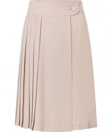 Feminine and flirty, this lovely blush-hued pleated skirt from Tara Jarmon is a chic must-have - Wide waistband with button-tab, full skirt with asymmetric pleating - Pair with a tie-neck blouse and heels