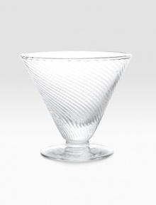 A stemless, mouthblown martini glass weds modern design with classic style thanks to a gentle, wrap-around texture. From the Twirl CollectionGlass3¾H X 3½ diam.Dishwasher safeImported 