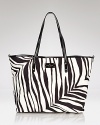 kate spade new york's stripe-splashed baby bag is a chic mommy must-have. With room enough for your babe's essentials, this bag is ready to stroll in style.