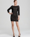 Articulated in lovely lace, this DIANE von FURSTENBERG dress is a romantic choice for after-dark style.