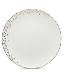 Fringed with shimmering leaves of platinum and mica, this bone china salad plate turns your table into a springtime utopia. Its sleek coupe shape is a vision of modern elegance in platinum-banded white.