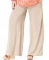 Enjoy the easy comfort of MICHAEL Michael Kors' plus size wide leg pants, cinched by a drawstring waist.