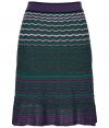 Polish your look with a chic feminine edge in Missoni Ms characteristic zigzag knit skirt - Flat elasticized waistband, black satin lining - Fitted waist, flared silhouette - Wear with a solid knit top and sophisticated heels