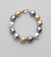 Soft shades come together in a substantial strand of lustrous baroque pearls. 14mm champagne, nuage, grey and white man-made, organic pearls 18k goldplated sterling silver spring clip clasp Length, about 8 Made in Spain