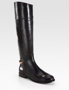 Beautiful equestrian-inspired silhouette of rich leather, backed by gleaming signature hardware. Stacked heel, 1 (25mm)Shaft, 17¼Leg circumference, 14Leather upperSide zipLeather lining and solePadded insoleImported