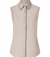 Work a chic edge into your workwear staples with Jil Sander Navys contrast trimmed shirt - Classic collar, sleeveless, button-down front, shirttail hemline, black trim - Tailored fit - Wear with a tailored blazer, pencil skirt and peep-toes