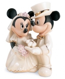 Commemorate any couple's magic day with this delightful Disney figurine featuring Mickey Mouse and Minnie Mouse. Accented with 24-karat gold and measures 5.5. Qualifies for Rebate