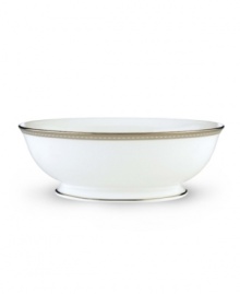 Metropolitan sensibility and modern design combine in this understated white bone china vegetable bowl from Lenox's collection of dinnerware and dishes. Platinum gild along the edge is enhanced by a clean, platinum geometric pattern reminiscent of architectural accents. Qualifies for Rebate