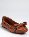 Savvy stitching lends unique appeal to a softest-ever pair of leather flats from Burberry.