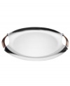 Polished aluminum alone makes Rivet serveware a standout, but with contrasting bronze handles and a sleek yet generously proportioned silhouette, this Dansk tray embodies modern sophistication.