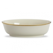 Tuxedo dinnerware is the epitome of formal dinnerware. The ivory fine china contrasts vibrantly against the rich gold interwoven accents. It's definitely a classic Lenox pattern. Pair it with gold-accented sterling and crystal, for elaborate entertaining. Dishwasher Safe.