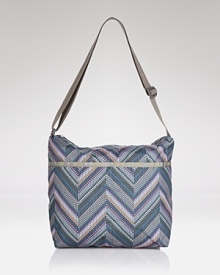 Keep the essentials close with LeSportsac's nylon crossbody bag in chevron print; practical interior zip compartments make those daily errands a little bit easier.