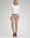 A crisp, slender-fitting style to top any classic outfit. Button front Back darts Cotton/elastene; machine wash Imported