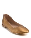 Spiky scallops make these classic ballet flats pretty tough. By Chloé.