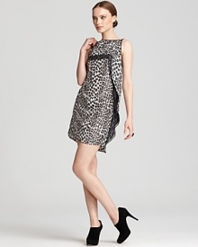 This Robert Rodriguez dress fashions a structured yet air-catching layered drape from leopard silk and black chiffon for a sleeveless mini with wild haute appeal.